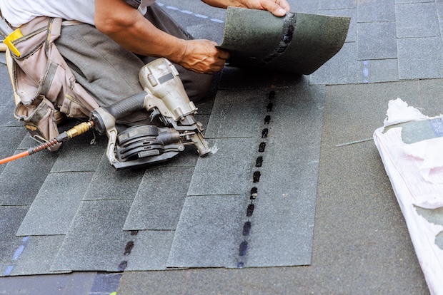 What Homeowners Should Know About Roofing Scams After a Storm